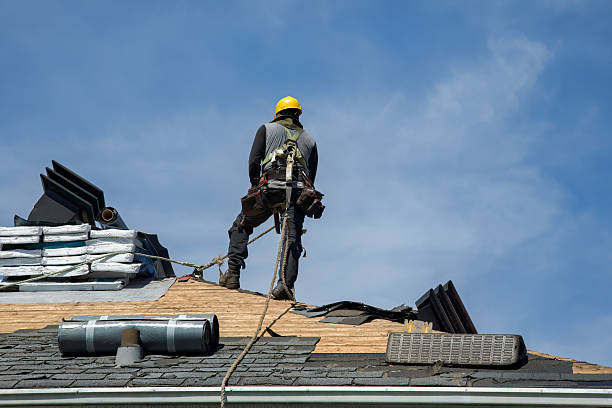Professional Roof Repair technician working in Bokeelia, FL